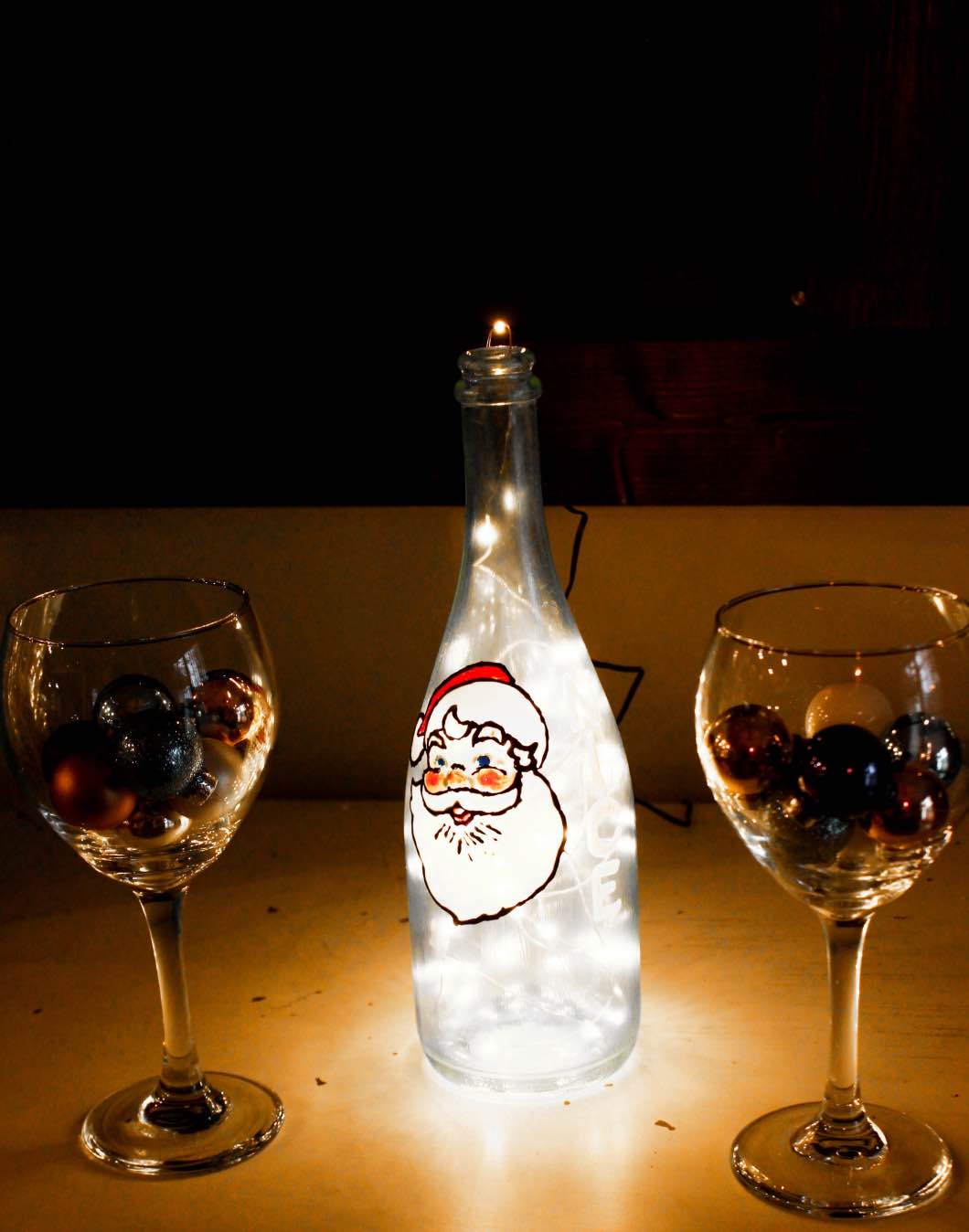 Santa Wine Painted Glass Bottle - Christmas Painted Wine Bottles by Atlanta style blogger Happily Hughes