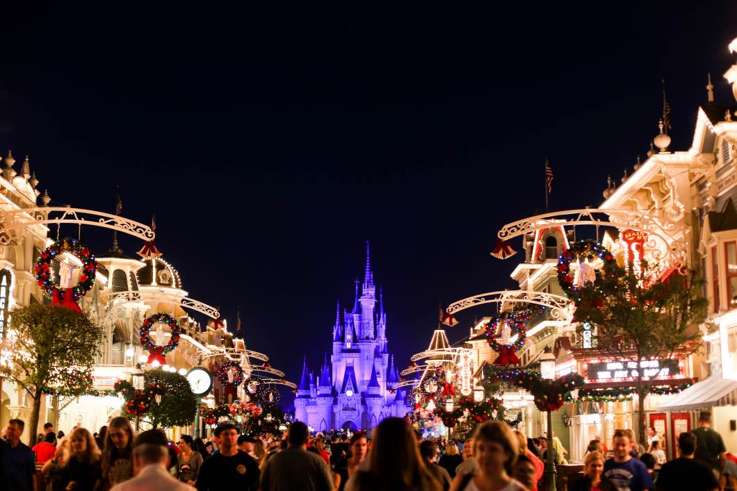 Mickeys Very Merry Christmas Main Street - Holiday Attractions in Orlando by Atlanta travel blogger Happily Hughes