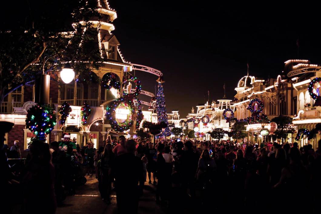 Mickey's Very Merry Christmas Main Street - Holiday Attractions in Orlando by Atlanta travel blogger Happily Hughes