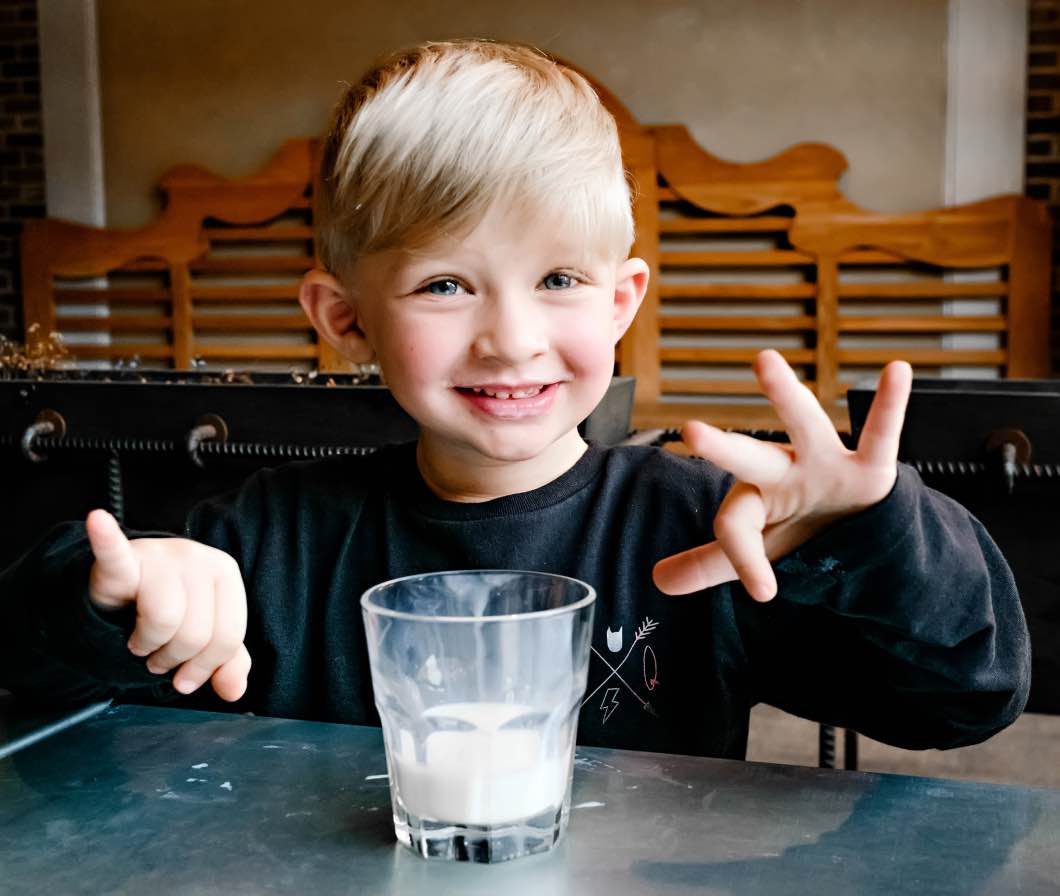 kids need milk - Why We Drink Milk by Atlanta mom blogger Happily Hughes