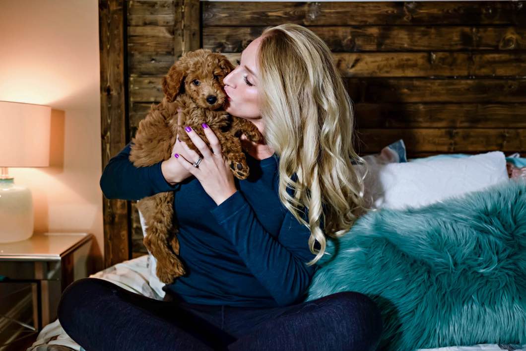 golden doodle snuggle fest - Best Warm Clothes For Cold Weather by Atlanta fashion blogger Happily Hughes