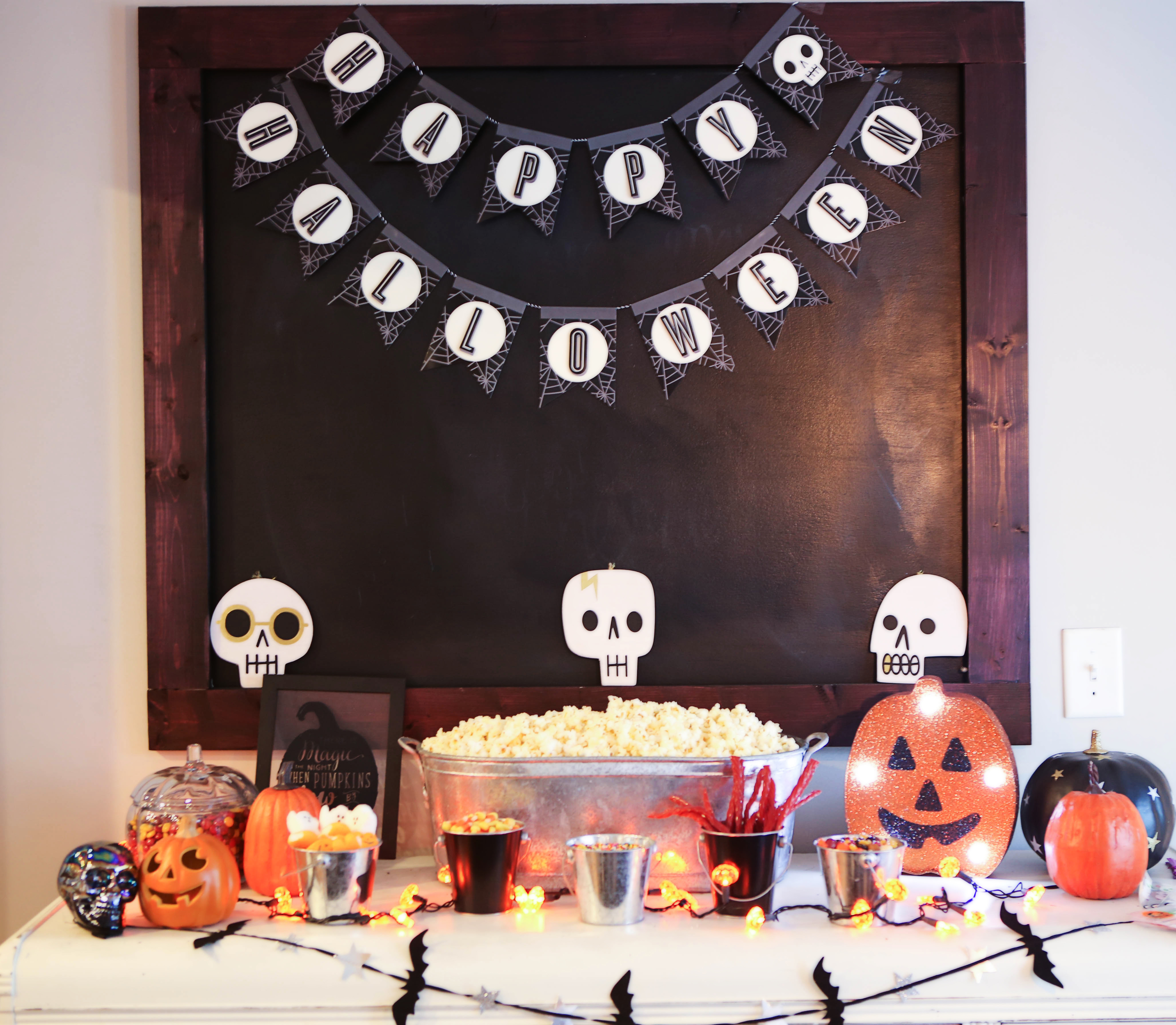 halloween popcorn bar DIY - Halloween Popcorn Bar by Atlanta lifestyle blogger Happily Hughes
